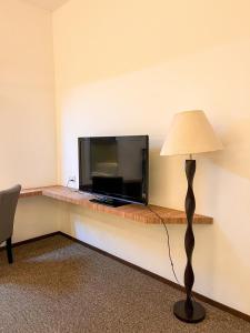 TV a/nebo společenská místnost v ubytování De Palma Hotel Ampang