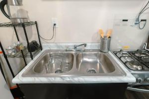 Kuchyň nebo kuchyňský kout v ubytování Departamento Nuevo + 21 fotografií