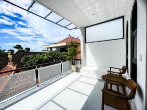 Balkón nebo terasa v ubytování Sundari Guesthouse Pererenan + 26 fotografií