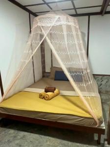 Postel nebo postele na pokoji v ubytování Tiger homestay 2 Phayam