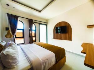 Postel nebo postele na pokoji v ubytování Sundari Guesthouse Pererenan