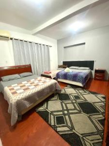 Ένα ή περισσότερα κρεβάτια σε δωμάτιο στο Pousada CASA BELLA VISTA 945