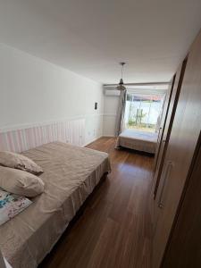 Postel nebo postele na pokoji v ubytování House in Brava 50 meters from the sea