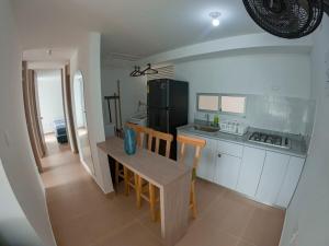 Kuchyň nebo kuchyňský kout v ubytování Descanso & Piscina en cómodo apartamento