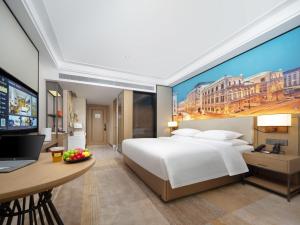 Μια τηλεόραση ή/και κέντρο ψυχαγωγίας στο Vienna International Hotel, Xi'an Jinye Road Zhangba Fourth Road Subway Branch