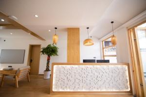 Et tv og/eller underholdning på Feihua Qingmeng Homestay + 46 billeder