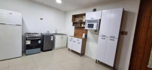Η κουζίνα ή μικρή κουζίνα στο Casa en el centro de llanquihue, hasta 10 personas +4 φωτογραφίες