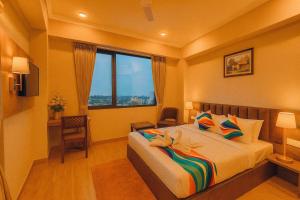 Postel nebo postele na pokoji v ubytování De Glance Udaipur + 32 fotografií