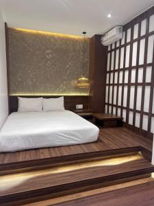 Postel nebo postele na pokoji v ubytování Nana Villa Hue