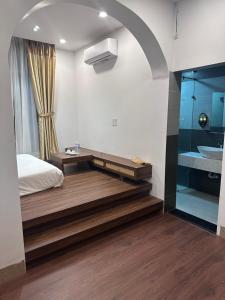 Postel nebo postele na pokoji v ubytování Nana Villa Hue