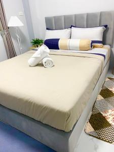 Postel nebo postele na pokoji v ubytování Singgah Homestay Yala + 14 fotografií