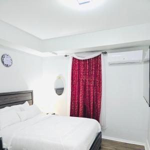 Ένα ή περισσότερα κρεβάτια σε δωμάτιο στο Home away from home