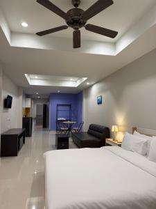 Ένα ή περισσότερα κρεβάτια σε δωμάτιο στο Subjomtien Pattaya Residences