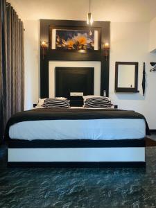 Postel nebo postele na pokoji v ubytování Unakuruwa silent beach villa