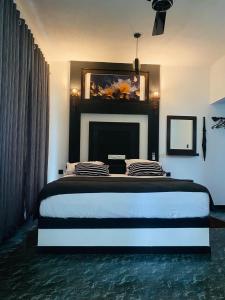 Postel nebo postele na pokoji v ubytování Unakuruwa silent beach villa