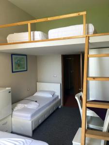 Postel nebo postele na pokoji v ubytování British Hotel