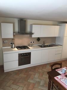 A kitchen or kitchenette at Alle Porte di Assisi Még 4 kép