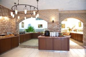 Kuchyň nebo kuchyňský kout v ubytování Pine Park Holiday Club