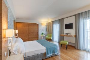 Postel nebo postele na pokoji v ubytování Hotel Eden