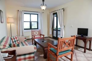 TV a/nebo společenská místnost v ubytování Pine Park Holiday Club