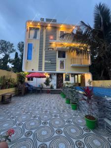 a building with a tile yard in front of it at JSP VILLA in Yelagiri