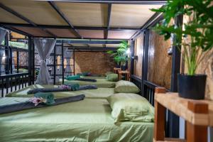 Postel nebo postele na pokoji v ubytování Gina hostel kohlanta