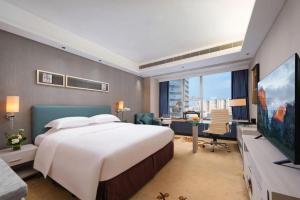 TV a/nebo společenská místnost v ubytování Leisure Hotel