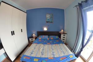 Posteľ alebo postele v izbe v ubytovaní Apartmani Jenny i Tania