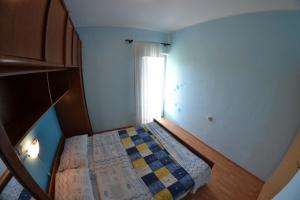 Posteľ alebo postele v izbe v ubytovaní Apartmani Jenny i Tania