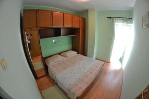 Posteľ alebo postele v izbe v ubytovaní Apartmani Jenny i Tania