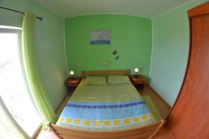 Posteľ alebo postele v izbe v ubytovaní Apartmani Jenny i Tania