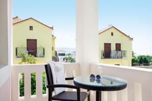 Ein Balkon oder eine Terrasse in der Unterkunft Aphrodite Samos Suites
