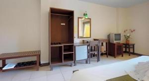 TV a/nebo společenská místnost v ubytování Bacchus Home Resort