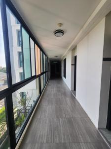 Fotografie z fotogalerie ubytování The High One Bangsaen v destinaci Ban Laem Thaen