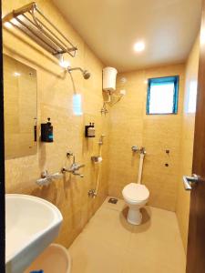 Koupelna v ubytování Great Samrat Residency + 14 fotografií