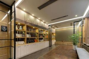 a large room with a store with shelves at Atour Hotel Nantong Langshan Scenic Area in Yongxingzhen