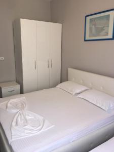 Postel nebo postele na pokoji v ubytování British Hotel