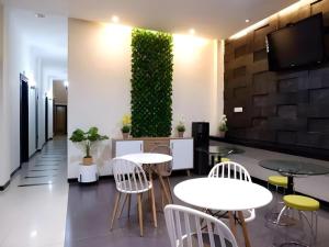 Posezení v ubytování Tropical Point Hotel Syariah + 95 fotografií