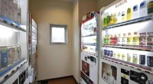 a grocery store aisle with products on the shelves at Hotel Sealuck Pal Mito in Mito