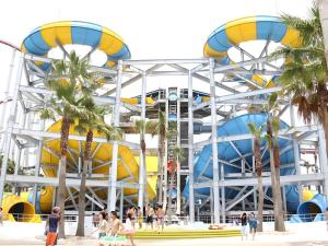 a view of a water park with people in front at Business Hotel BL Kuwana in Kuwana