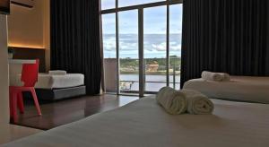 Postel nebo postele na pokoji v ubytování Place2Stay Business Hotel @ Waterfront + 58 fotografií