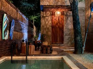 Bazén v ubytování La Casa de María 11:11 nebo v jeho okolí