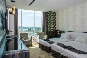 Postel nebo postele na pokoji v ubytování MH Hotels Ipoh + 223 fotografií