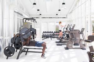 a man and a woman working out in a gym at Ha(a)ïtza in Pyla-sur-Mer