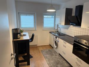 Kuchyň nebo kuchyňský kout v ubytování Home im Pott - Sehr Zentral - 4 Pers, TV + 3 fotografie