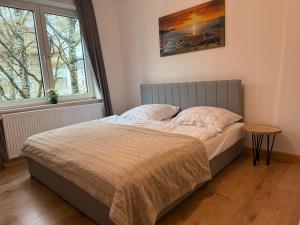 Postel nebo postele na pokoji v ubytování Home im Pott - Sehr Zentral - 4 Pers, TV