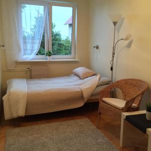 Ліжко або ліжка в номері Apartament Nadmorski Brzeźno