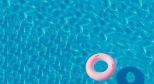 a pink swim ring in a swimming pool at Homely Syariah in Kediri +55 photos