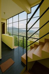 Postel nebo postele na pokoji v ubytování Dreamview Cottage by BEN Groups