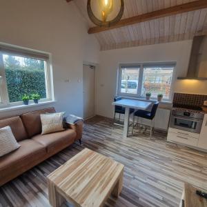 Posezení v ubytování Holiday house de Bosuil - 2 km from the beach